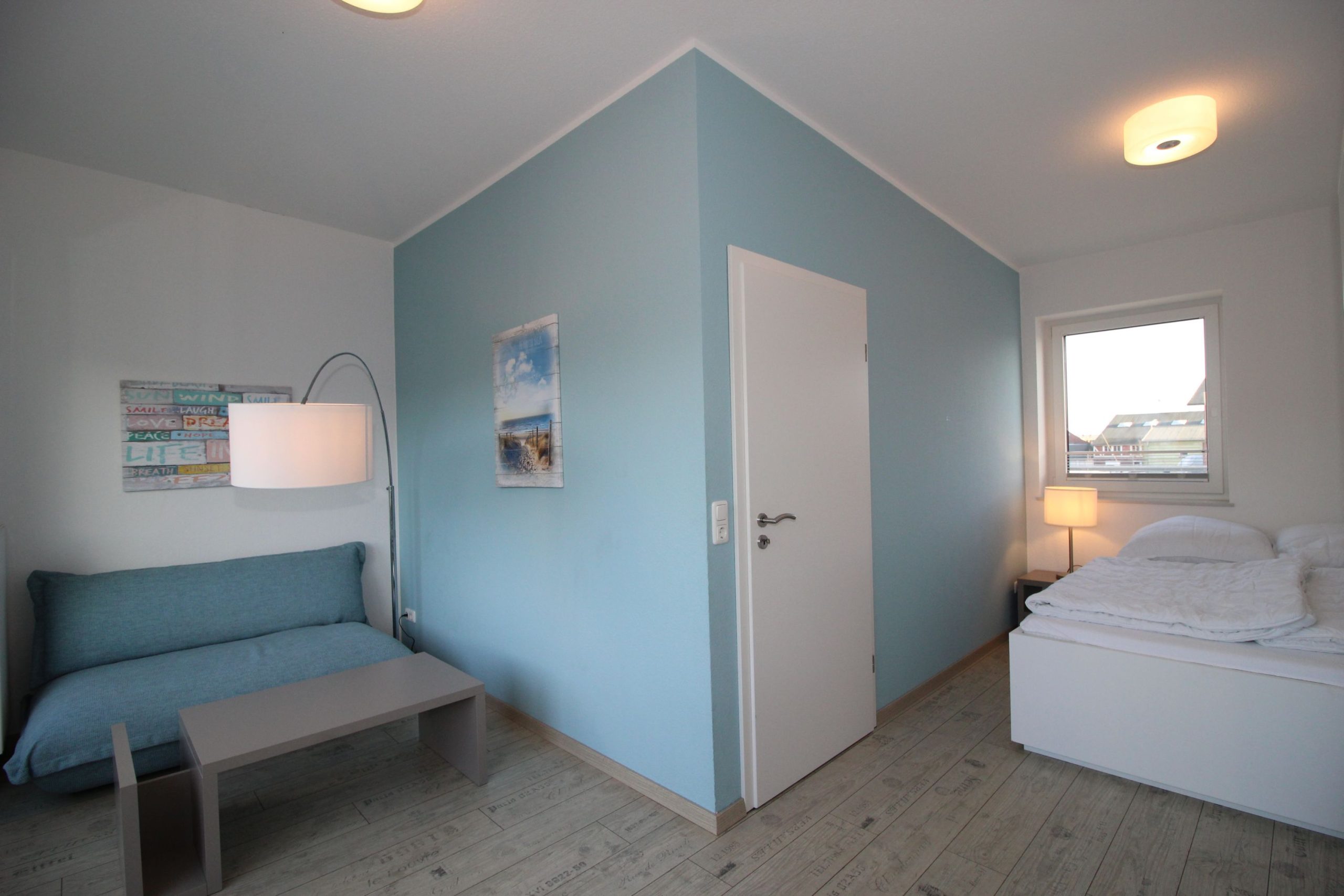 Schlafzimmer mit Doppelbett in Ferienhaus in Cuxhaven
