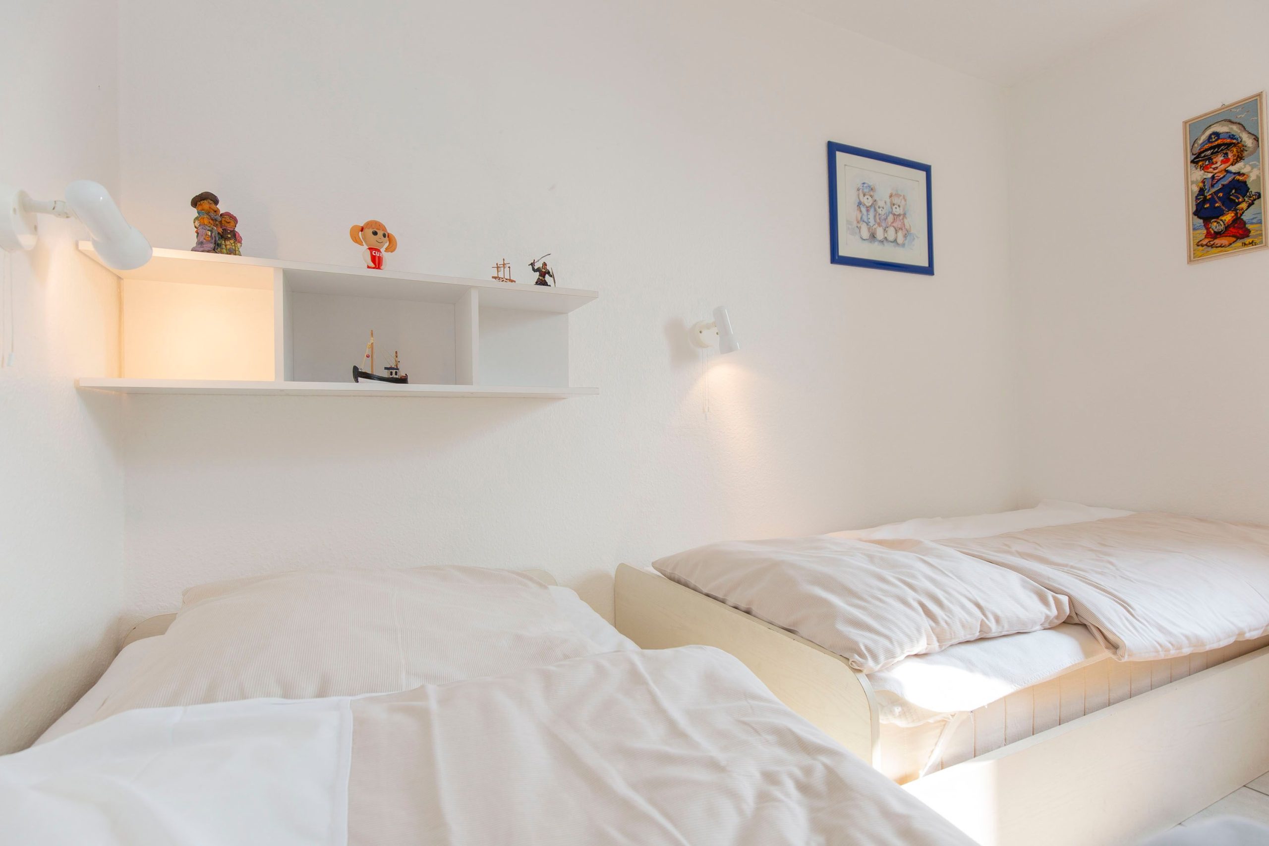 Schlafzimmer mit zwei Einzelbetten in Ferienwohnung in Cuxhaven